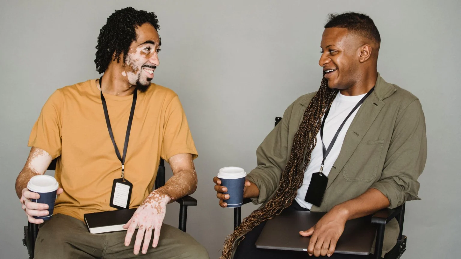 Two colleagues chatting during a coffee break