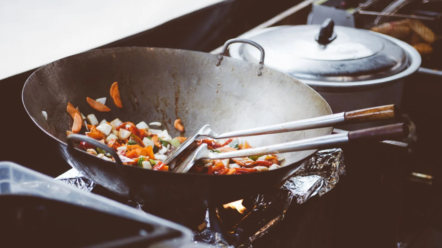 Colourful vegetables cooking in a wok